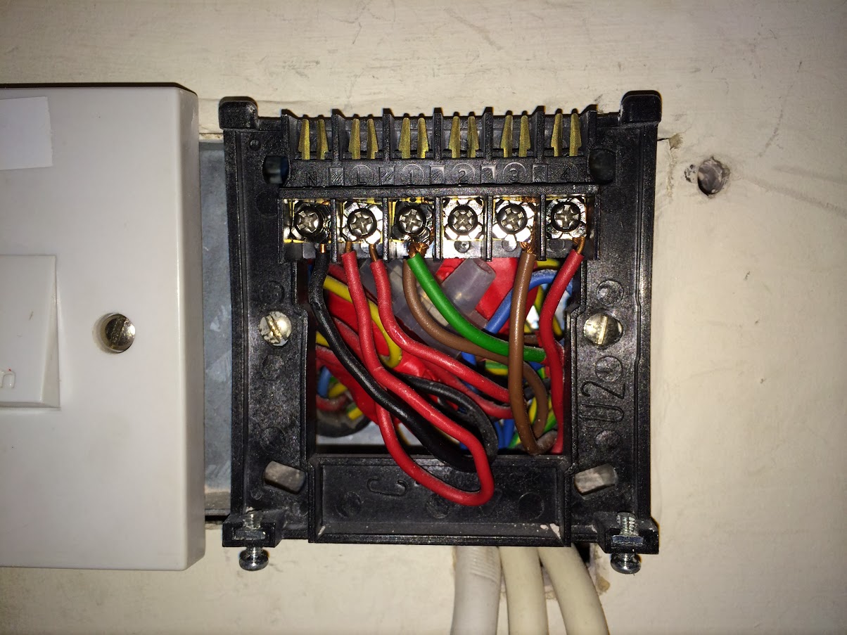 Behind the heating controller